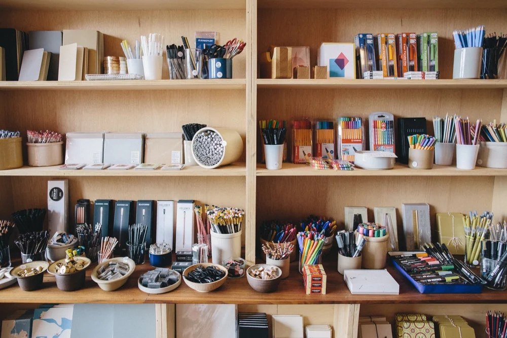 Shelves of curated art supplies